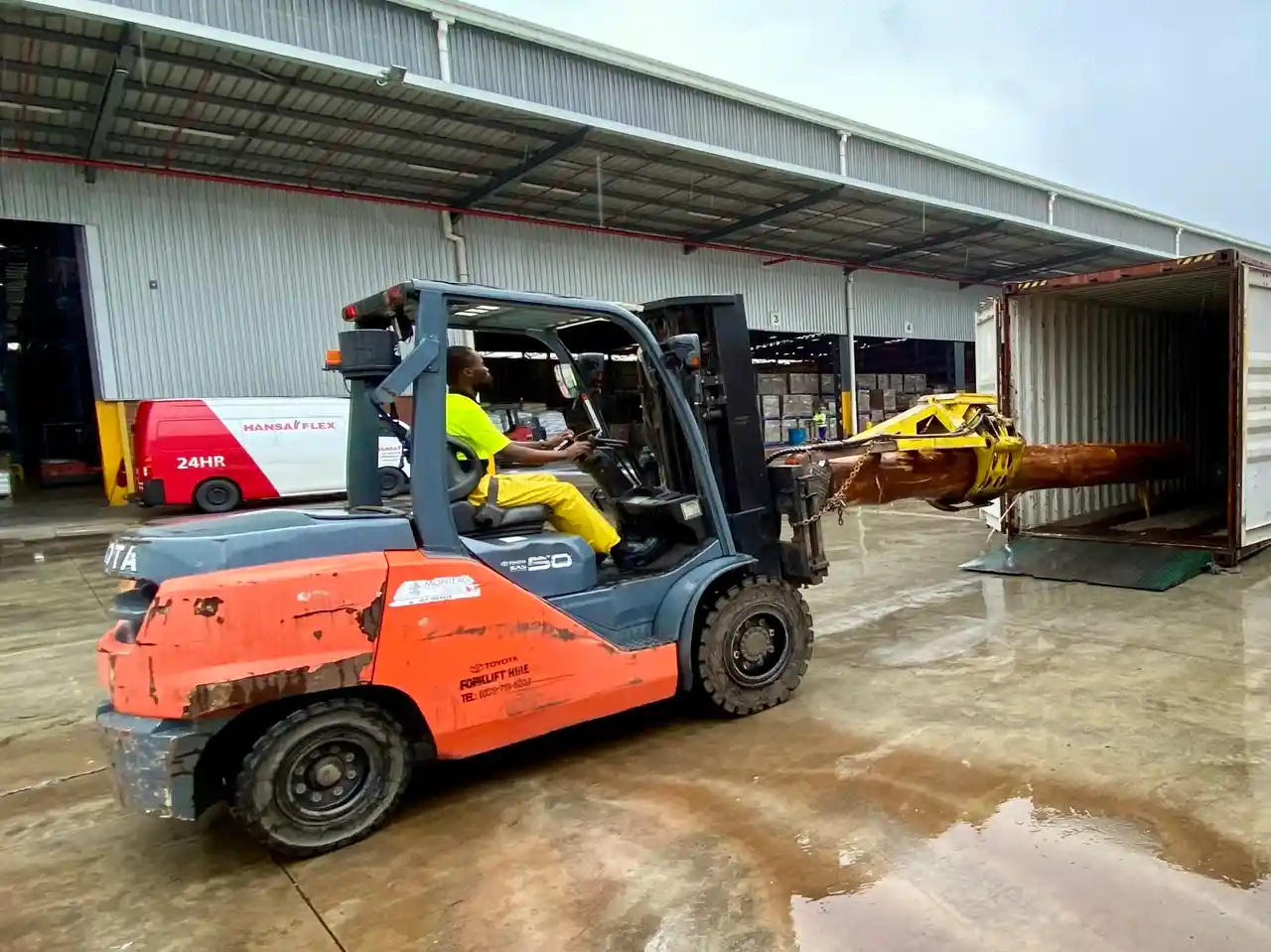 Timber Logs Being Packed at Connect Logistics Warehouse